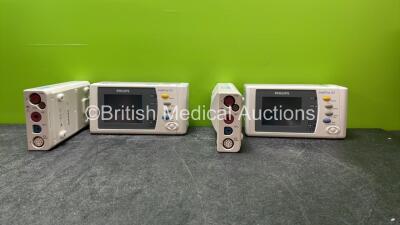 2 x Philips IntelliVue X2 Handheld Patient Monitors Including ECG, SpO2, NBP, Press and Temp Options with 2 x Philips M3001A Modules Including ECG, SpO2, NBP, Press and Temp Options (Both Power Up, Batteries Not Included) *SN DE315C6503, DE506H9435, DE907