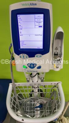 1 x Accoson Blood Pressure Meter on Stand (Missing Front Cover) 1 x Welch Allyn SPOT Vital SIgns LXi Monitor on Stand with Leads (Powers Up) , 1 x Therapy Ltd Suction Pump (Powers Up) and 1 x Arjo Alenti Patient Hoist with Controller (Not Power Tested Due - 2