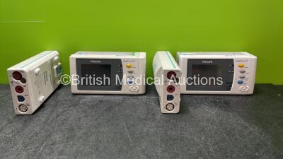 2 x Philips IntelliVue X2 Handheld Patient Monitors Including ECG, SpO2, NBP, Press and Temp Options with 2 x Philips M3001A Modules Including ECG, SpO2, NBP, Press and Temp Options (Both Power Up, Batteries Not Included) *SN DE9503939375, DE315C6563, DE4