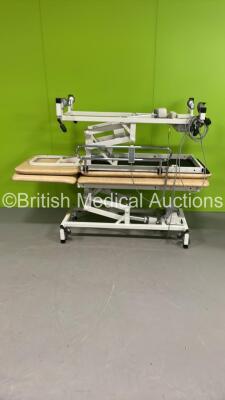 2 x Huntleigh Electric Patient Examination Couches with Controllers (Both Power Up) *S/N 09685 / 09682*