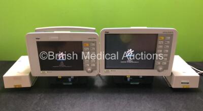 Job Lot Including 1 x Drager Infinity Delta XL Patient Monitor and 1 x Drager Infinity Delta Monitor with HemoMed 1, Aux/Hemo 2, Aux/Hemo 3, NBP and MultiMed Options, 2 x Siemens Docking Stations and 2 x AC Power Supplies (Both Power Up, 1 x Damage to Cas