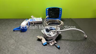 Mixed Lot Including 1 x Covidien Genius 3 Thermometer and Base Unit, 1 x Hill Rom Bed Controller, 1 x GE Carescape V100 Patient Monitor with 2 x NIBP Hoses and 1 x SpO2 Lead *SN SH6154495294SA, N20737372*