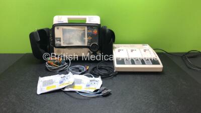 Medtronic Physio Control Lifepak 12 12-Lead Biphasic Defibrillator / Monitor with ECG, NIBP, SPO2 (Damaged / Missing Port) and Printer Options, 4 and 6 Lead ECG Leads, Paddle Lead, 2 x Skintact Electrodes *Expired - 10/2022*, Medtronic Physio-Control Batt