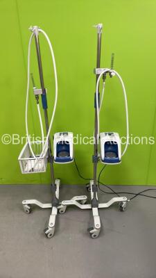 2 x Fisher and Paykel Airvo 2 Humidifiers on Stands with Hoses (Both Power Up with Dim Displays) *S/N 1701090425545*