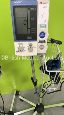 7 x Omron HEM-907 Digital Blood Pressure Monitors on Stands with Hoses and Cuffs ( All Power Up) *S/N 58000003AF / 20100400200AF / 20100100298AF / 20100400599AF / 20100400297AF / 20100100582AF / 20100200461AF* - 2