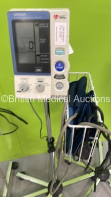 7 x Omron HEM-907 Digital Blood Pressure Monitors on Stands with Hoses and Cuffs ( All Power Up) *S/N 58000003AF / 20100400200AF / 20100100298AF / 20100400599AF / 20100400297AF / 20100100582AF / 20100200461AF* - 3