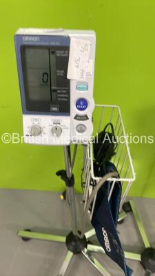 7 x Omron HEM-907 Digital Blood Pressure Monitors on Stands with Hoses and Cuffs ( All Power Up) *S/N 58000003AF / 20100400200AF / 20100100298AF / 20100400599AF / 20100400297AF / 20100100582AF / 20100200461AF* - 6