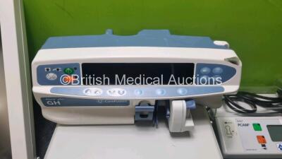 Mixed Lot Including 1 x Fisher & Paykel Airvo 2 Humidifier, 1 x Gastro CH ECK Gastrolyzer. 1 x GE CDA19T Patient Monitor with Stand (Damaged Stand - See Photo), 1 x Carefusion Alaris Plus GH Syringe Pump, 2 x Diathermy Forceps, 1 x Conmed Footswitch and - 2