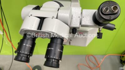 Leica M680 Dual Operated Surgical Microscope with 4 x 10x/21B Eyepieces, 2 x 10x/21 Eyepieces, Wild 445597 f=200mm Lens and 2 x Footswitches (Powers Up with Good Bulb) *060695005* - 3