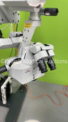 Leica M680 Dual Operated Surgical Microscope with 4 x 10x/21B Eyepieces, 2 x 10x/21 Eyepieces, Wild 445597 f=200mm Lens and 2 x Footswitches (Powers Up with Good Bulb) *060695005* - 5