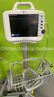 2 x GE DASH 3000 Patient Monitors on Stands with BP1/3, BP2/4, SPO2, Temp/Co, CO2, NBP and ECG Options (Both Power Up with Some Damaged/Missing Casing - See Photos) *D3DJ7387G / H3EHE823G* - 2