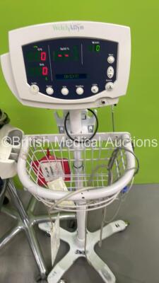 Mixed Lot Including 1 x Welch Allyn 53NT00 Vital Signs Monitor on Stand, 1 x Welch Allyn 5200 Series Vital Signs Monitor on Stand,(Both Power Up) 1 x Walking Aid, 1 x RDP Mobile Workstation and 1 x Arjo Manual Standing Aid *S/N JA122168* - 5