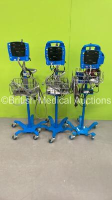 1 x GE Dinamap Carescape V100 Vital Signs Monitor on Stand, 1 x GE Dinamap ProCare Auscultatory Vital Signs Monitor on Stand and 1 x GE Dinamap ProCare Auscultatory 400 Vital Signs Monitor on Stand (All Power Up - 1 x Missing Wheel) *S/N SDT10490683SA*