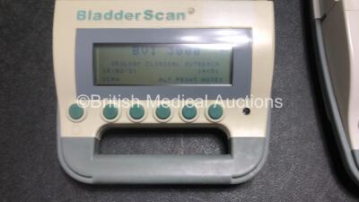 2 x Verathon BVI 3000 Bladder Scanners with 3 x Batteries and 1 x Transducer / Probe in 2 x Carry Bags (Both Power Up with Damage to Casing) *SN 08461210 / 09111568* - 2