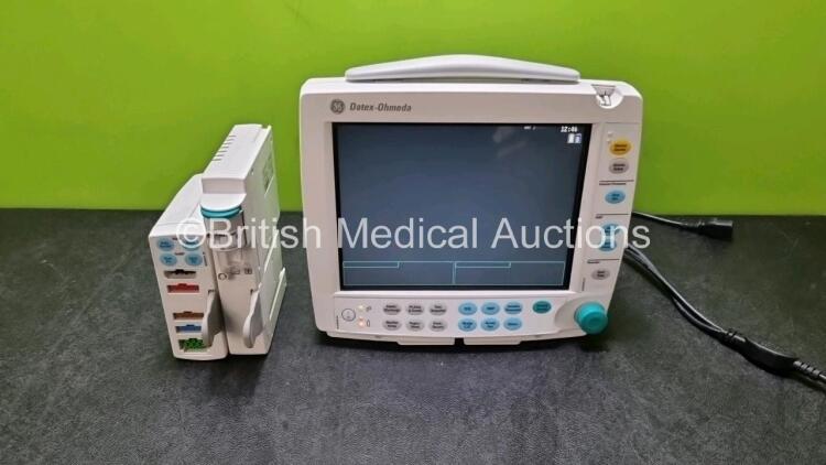 Job Lot Including 1 x GE Type F-FM-00 Patient Monitor (Powers Up, Missing Light Cover - See Photo) with 1 x GE Type E-PSMP-00 Module with ECG, SpO2, T1,T2 P1, P2 and NIBP Options and 1 x GE Type N-FC-00 Module with Mini D-Fend Water Trap *SN 6353155 / 63