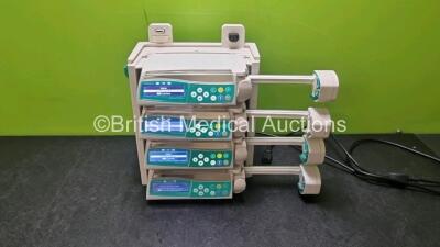 4 x B Braun Perfusor Space Syringe Pumps with 1 x B.Braun Space Docking Station - Missing Cover (All Power Up) *SN 72416 / 99196 / 237187 / 277344*