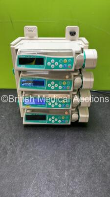 4 x B Braun Perfusor Space Syringe Pumps (All Power Up) with 1 x B.Braun Space Docking Station - Missing Cover (2 x Ports Not Working) *SN 72414 / 197768 / 98093 / 97394*