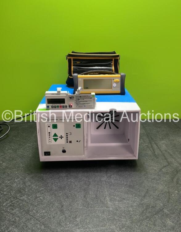 Mixed Lot Including 1 x CME Medical T34 Syringe Pump (Powers Up) 1 x GE TruSat Oximeter In Carry Case (Powers Up) 1 x Covidien RapidVac Smoke Evacuator Unit (No Power with Missing Filter-See Photo) *SN 21999, FCD13210003SA, VL013496X*