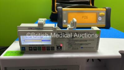 Mixed Lot Including 1 x CME Medical T34 Syringe Pump (Powers Up) 1 x GE TruSat Oximeter In Carry Case (Powers Up) 1 x Covidien RapidVac Smoke Evacuator Unit (No Power with Missing Filter-See Photo) *SN 21999, FCD13210003SA, VL013496X* - 3