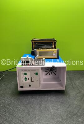 Mixed Lot Including 1 x CME Medical T34 Syringe Pump (Powers Up) 1 x GE TruSat Oximeter In Carry Case (Powers Up) 1 x Covidien RapidVac Smoke Evacuator Unit (No Power with Missing Filter-See Photo) *SN 21999, FCD13210003SA, VL013496X* - 6