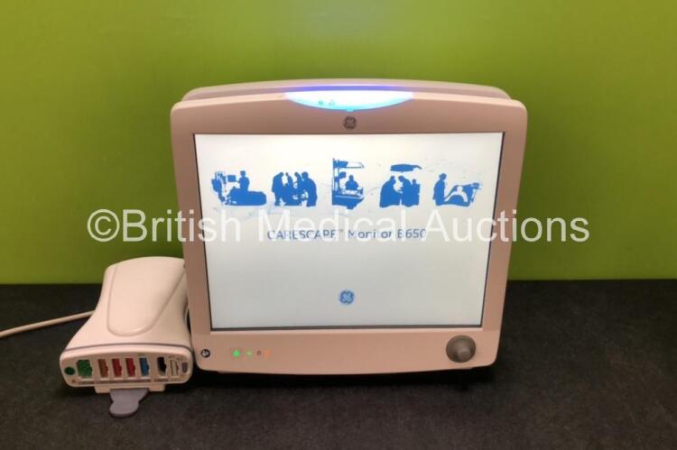 GE Carescape B650 Touch Screen Patient Monitor *Mfd - 2019* with 1 x GE Dinamap Ref- 2016793-002 Patient Data Module Including ECG, Temp/CO, P1/P3, P2/P4, SpO2 and NIBP Options *Mfd 2019* (Both Power Up - In Excellent Condition Like New in Box) **SN SPX19