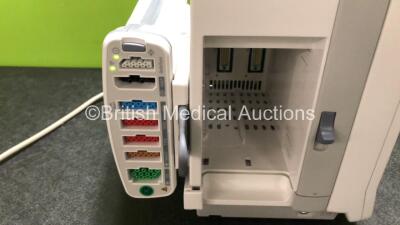 GE Carescape B650 Touch Screen Patient Monitor *Mfd - 2019* with 1 x GE Dinamap Ref- 2016793-002 Patient Data Module Including ECG, Temp/CO, P1/P3, P2/P4, SpO2 and NIBP Options *Mfd 2019* (Both Power Up - In Excellent Condition Like New in Box) **SN SPX19 - 4