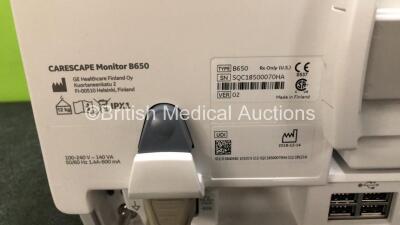 GE Carescape B650 Touch Screen Patient Monitor *Mfd - 2018* with 1 x GE Dinamap Ref- 2016793-002 Patient Data Module Including ECG, Temp/CO, P1/P3, P2/P4, SpO2 and NIBP Options *Mfd 2019* (Both Power Up - In Excellent Condition Like New in Box) **SN SPX19 - 5