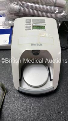 Mixed Lot Including 4 x Fisher & Paykel Icon + Novo CPAP Units (All Power Up) 1 x Inva CareSoft Form Active 2 Unit (No Power) 1 x Fisher & Paykel Sleepstyle 200 CPAP Humidifier with 5 x Fisher & Paykel REF 900HC522 Breathing Tubes (Powers Up) Large Quant - 7