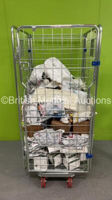 Large Quantity of Consumables Including Various Defibrillator Pads (Out of Date) and Face Masks (Cage Not Included)