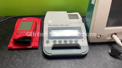 Mixed Lot Including 1 x Verathon Model BVI 3000 Bladder Scanner, 1 x Hemocue Hb201 DM Radiometer (Powers Up) 1 x Nexfin bm Patient Monitor with 2 x Cables (Powers Up with Damage-See Photo) 2 x DeVilbiss Suction Units with 2 x Cups (Both No Power, 1 with D - 2