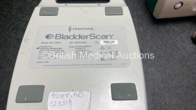 Mixed Lot Including 1 x Verathon Model BVI 3000 Bladder Scanner, 1 x Hemocue Hb201 DM Radiometer (Powers Up) 1 x Nexfin bm Patient Monitor with 2 x Cables (Powers Up with Damage-See Photo) 2 x DeVilbiss Suction Units with 2 x Cups (Both No Power, 1 with D - 6