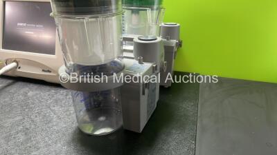 Mixed Lot Including 1 x Verathon Model BVI 3000 Bladder Scanner, 1 x Hemocue Hb201 DM Radiometer (Powers Up) 1 x Nexfin bm Patient Monitor with 2 x Cables (Powers Up with Damage-See Photo) 2 x DeVilbiss Suction Units with 2 x Cups (Both No Power, 1 with D - 8