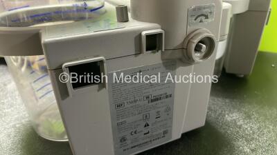 Mixed Lot Including 1 x Verathon Model BVI 3000 Bladder Scanner, 1 x Hemocue Hb201 DM Radiometer (Powers Up) 1 x Nexfin bm Patient Monitor with 2 x Cables (Powers Up with Damage-See Photo) 2 x DeVilbiss Suction Units with 2 x Cups (Both No Power, 1 with D - 9