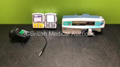 Job Lot Including 2 x Smiths Medical CADD Model 2110 Ambulatory Infusion Pumps with 1 x Power Supply and 2 x Pole Mount Adapters (Both Power Up) and 1 x CareFusion Alaris PK Syringe Pump (Powers Up with Faulty Screen - See Photos) *SN 1066778 / 1066574 / 