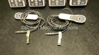 4 x Smiths Medical CADD Model 2110 Ambulatory Infusion Pumps with 4 x Power Supplies, 4 x Pole Mount Adapters, 4 x Pole Mount Brackets and 2 x Controls (All Power Up) *SN 1066703 / 1066489 / 1066494 / 1066702* - 4