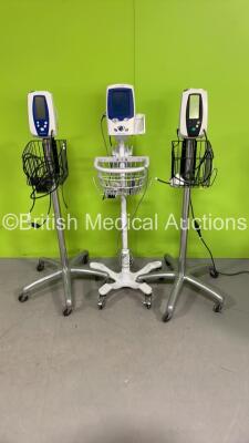 2 x Welch Allyn Spot Vital Signs Monitors on Stands (Both Power Up) and 1 x Welch Allyn LXi Monitor on Stand with Power Supplies (No Power)