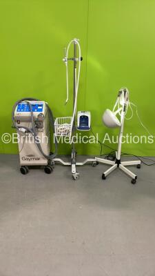 1 x Fisher and Paykel Airvo 2 Humidifier on Stand with Hose, 1 x Heraeus Patient Examination Lamp on Stand (Damaged Mounting Point - See Pictures) and 1 x Gaymar Medi-Therm III Patient Warmer (All Power Up) *S/N 5112904 / 507288 / 54103336*