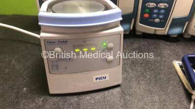 Mixed Lot Including 6 x CareFusion Alaris GP Guardrails Plus Infusion Pumps, 1 x Fisher & Paykel MR850AEK Respiratory Humidifier (Powers Up) 1 x B.Braun Infusomat Space Infusion Pump (Powers Up) and 1 x CareFusion IVAC PCAM Pump *SN 135284065 / 135284789 - 2