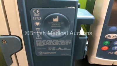 Mixed Lot Including 6 x CareFusion Alaris GP Guardrails Plus Infusion Pumps, 1 x Fisher & Paykel MR850AEK Respiratory Humidifier (Powers Up) 1 x B.Braun Infusomat Space Infusion Pump (Powers Up) and 1 x CareFusion IVAC PCAM Pump *SN 135284065 / 135284789 - 8