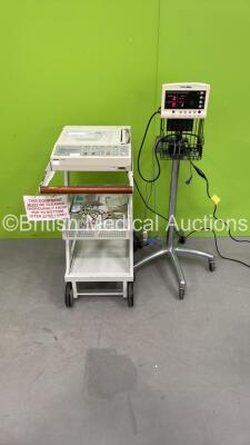 1 x Philips PageWriter 100 ECG Machine with ECG Lead on Trolley (Missing Printer Cover and Casing Damage - See Photo) and 1 x Welch Allyn 52000 Series Monitor on Stand with Leads (Both Power Up) *US00626550 / na*