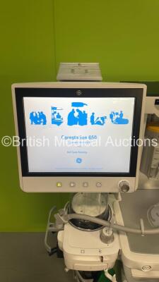 GE Carestation 650 Anaesthesia Machine Ref 1012-9650-000 *Mfd - 10/2015* Software Version 01/ SP08 with GE Monitor, Baxter Drager Vapor 2000 Sevoflurane Vaporizer, Baxter Drager D-Vapor Desflurane Vaporizer,Assorted Leads,Module, Absorber, Bellows and Hos - 11