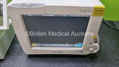 Job Lot Including 1 x Philips IntelliVue MP30 Patient Monitor (Powers Up Damage to Casing and Scratching On Screen - See Photo 1 x Philips IntelliVue X2 Handheld Patient Monitor Including ECG, SpO2, NBP, Temp and Press Options (Powers Up Damage to Casing - 2