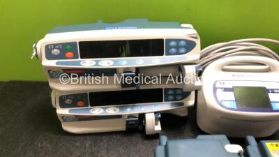 Mixed Lot Including 2 x Cardinal Health Alaris CC Guardrails Plus Syringe Pumps, 1 x Asena GW Pump, 1 x Cardinal Health Alaris GW Pump and 2 x Covidien Kendall SCD 700 Series Compression Systems (Both Power Up with Foreign Plug Adapter, Adapter Not Includ - 2