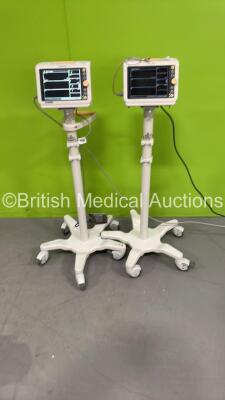 2 x Philips SureSigns VM4 Patient Monitors on Stands (Both Power Up)