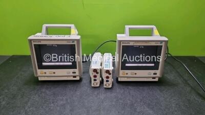 Job Lot Including 2 x Philips M3046A Patient Monitors (Both Power Up 1 x with Missing Module Clip - See Photo) and 2 x Philips M3001A ModuleS Including ECG, SpO2, NBP, Press and Temp Options *SN DE51299358 / DE22729898 / DE00850692 / DE00850695*