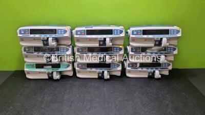 Job Lot Including 8 x Carefusion Alaris CC Syringe Pumps (All Powers Up) and 1 x Carefusion Alaris PK Syringe Pump (No Power)