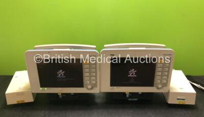 2 x Drager Infinity Delta Patient Monitors with HemoMed 1, Aux/Hemo 3, NBP and MultiMed Options, 2 x Siemens Docking Stations and 2 x AC Power Supplies (Both Power Up, 1 x Damage to Casing - See Photos)