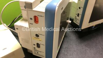 2 x Drager Infinity Delta Patient Monitors with HemoMed 1, Aux/Hemo 3, NBP and MultiMed Options, 2 x Siemens Docking Stations and 2 x AC Power Supplies (Both Power Up, 1 x Damage to Casing - See Photos) - 4