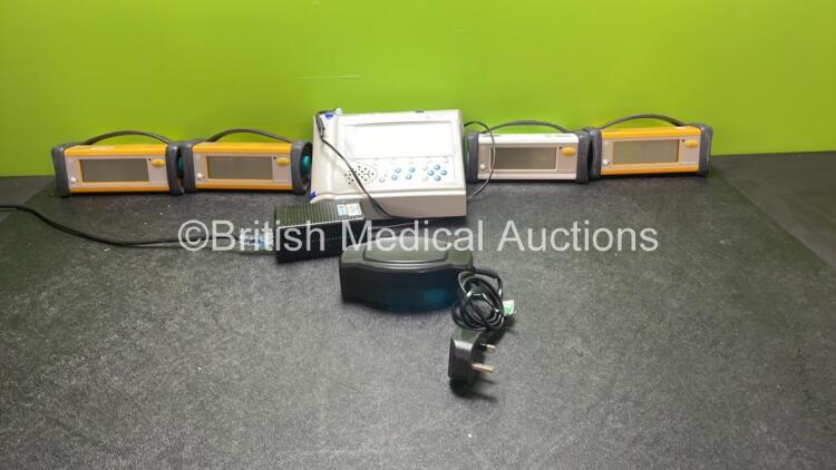 Mixed Lot Including 1 x Huntleigh Dopplex Assist Unit with 1 x Charger Cradle and 1 x AC Power Supply (Powers Up with Blank Screen and Alarm) 4 x GE Ohmeda Trusat Pulse Oximeters (All Untested Due to Missing Power Supplies) 1 x Phoenix Met Charger (Powers