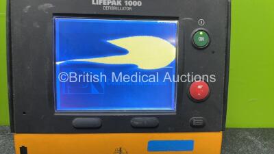 Medtronic Lifepak 1000 Defibrillator (Powers Up with Cracked Screen when Tested with Stock Battery-Battery Not Included) *SN 35225022* - 2